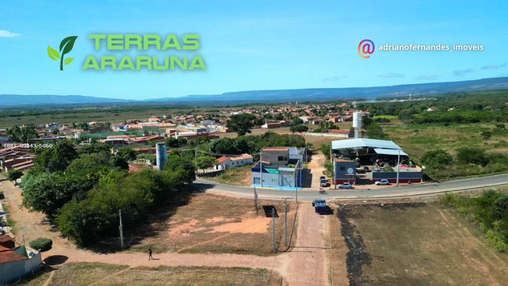 Acesso do Terras Araruna junto à rodovia e às construções do bairro
